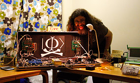 Vadim Makarov showing an equipment demo at Hacking at Random conference, August 2009 (photographed by a visitor)