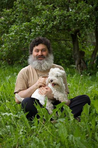 Vadim Makarov and his family dog Snezhka in June 2023